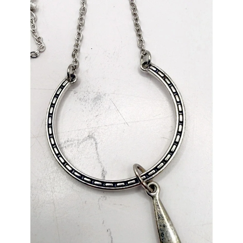 Source Unknown long silver